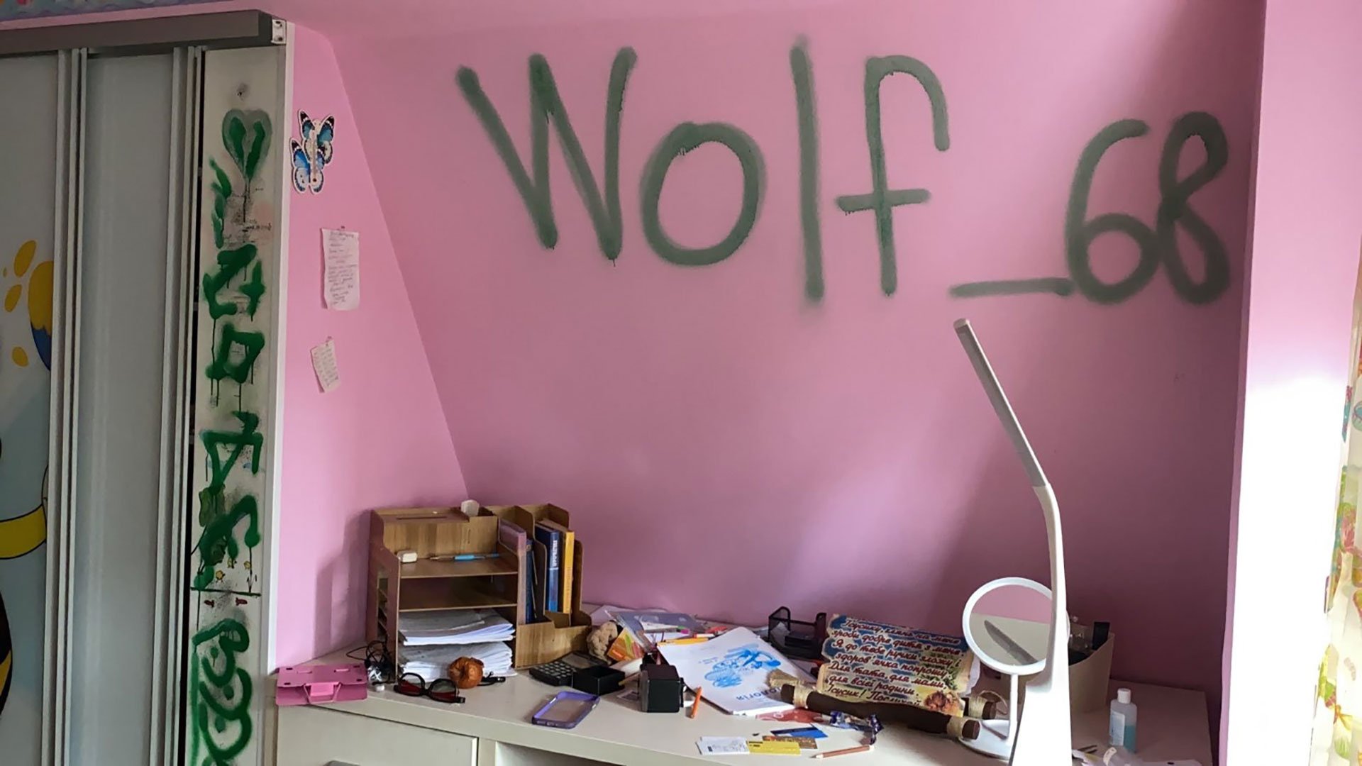 Russian soldiers tag ‘Wolf_68’ in a house