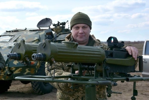 WW1 artillery ammo and Ukrainian Maxim guns with red dot sights