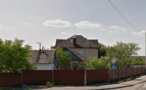 GeoLocated photo of Irpine evacuation amid street shooting