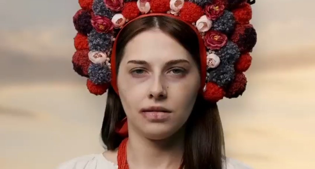 Video depicts injured woman symbolizing Ukraine’s suffering and abuse