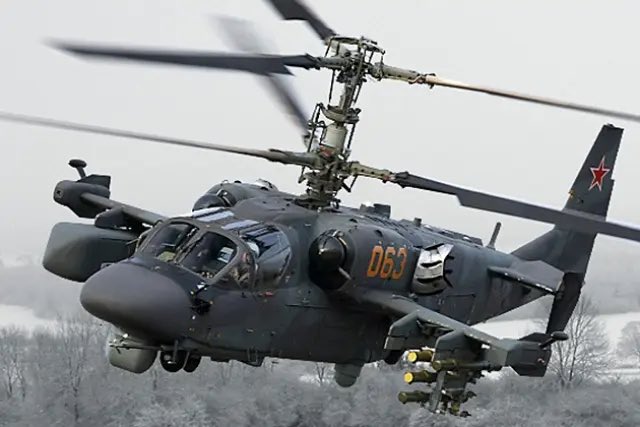Russian Ka-52 attack helicopter crashes in Kerch Strait (12 words max)