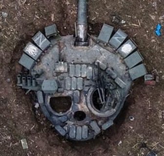 Destroyed Russian turret mirrors futile war