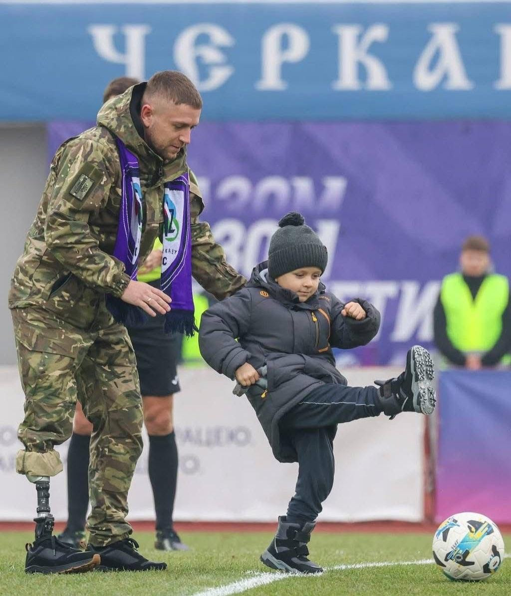 War veteran leads team in football and sitting volleyball