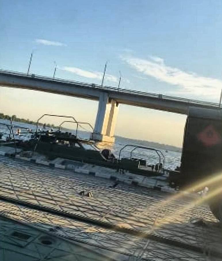 Russian military pontoon crossing near Antonovsky bridge