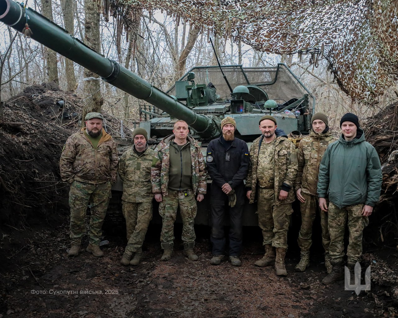 Ukrainian crew and captured T-80 tank