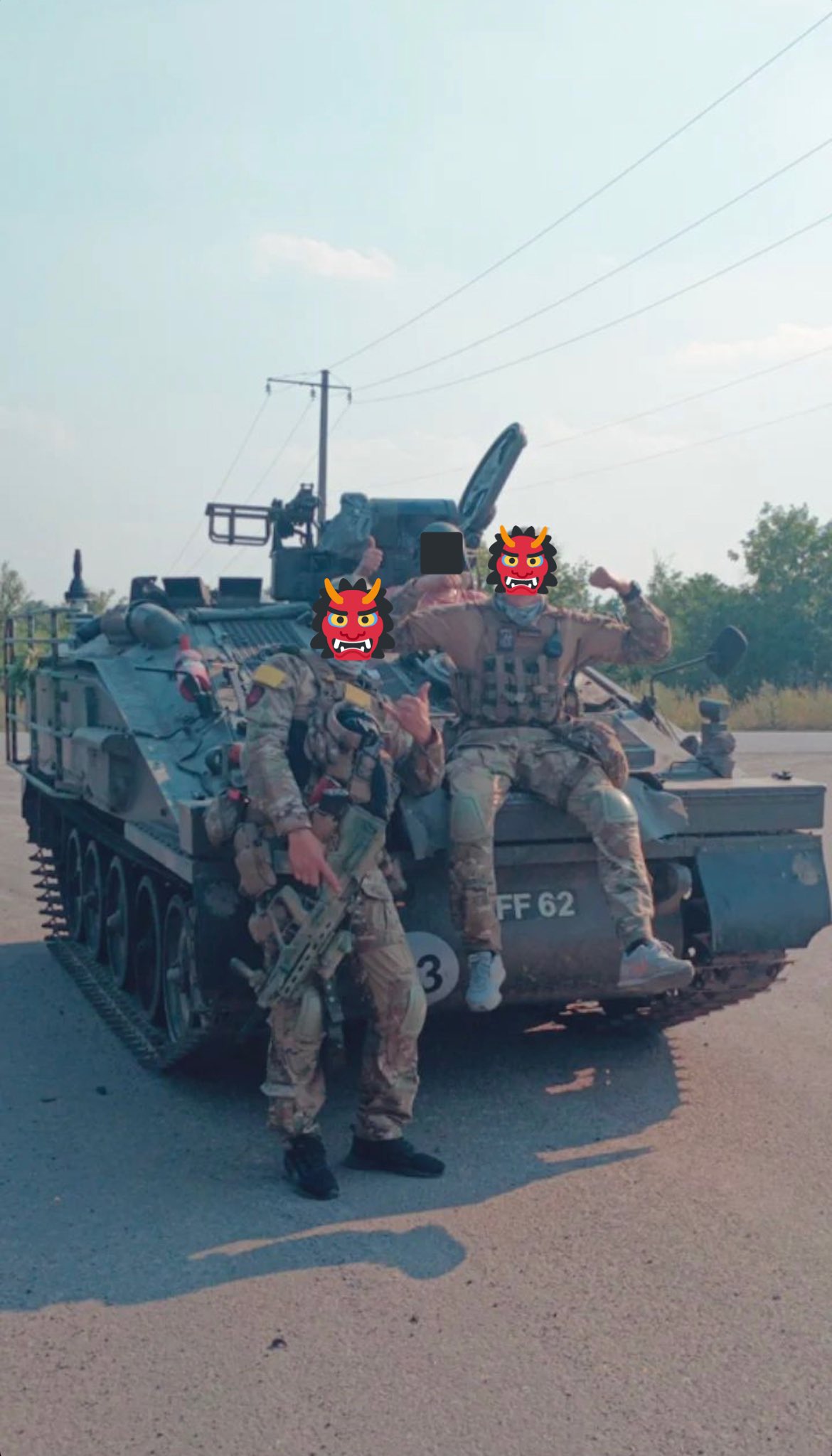Ukrainian special forces operators with a British Spartan
