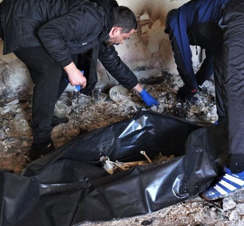 Bombed Kharkiv apartment where 95-year-old prisoner died
