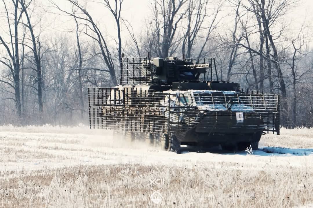 Assault troops train in disembarking from BTR-4E