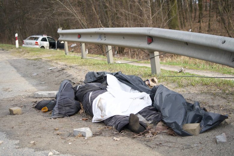 Shot cars and civilian bodies near Kyiv