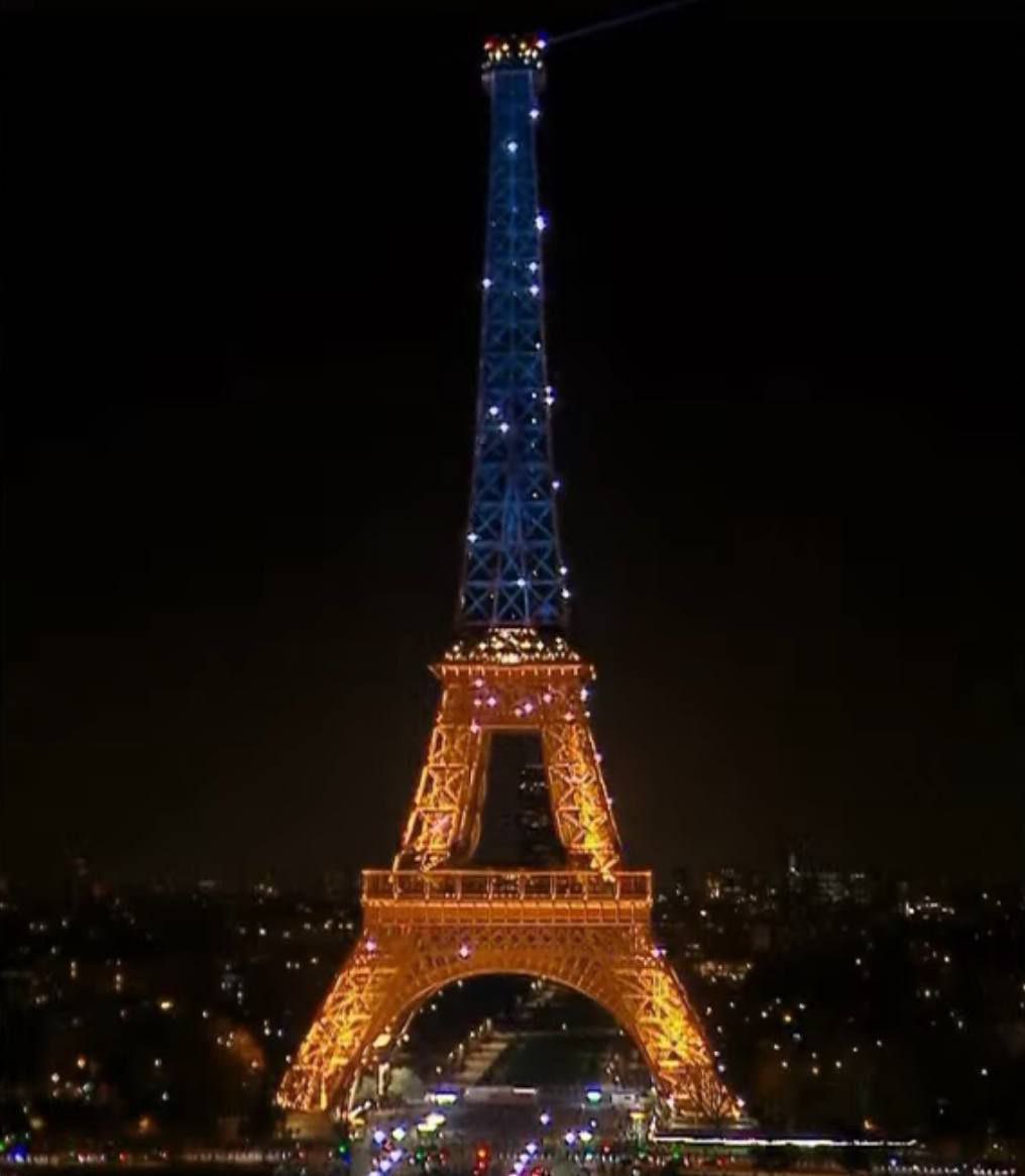 Eiffel Tower lit in Ukrainian colors