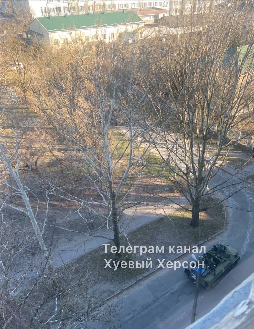 Russian military vehicles on hospital grounds in Kherson