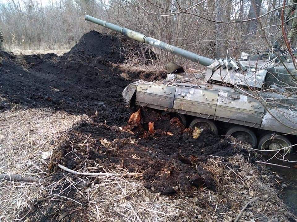 Russian occupiers buried their own tanks