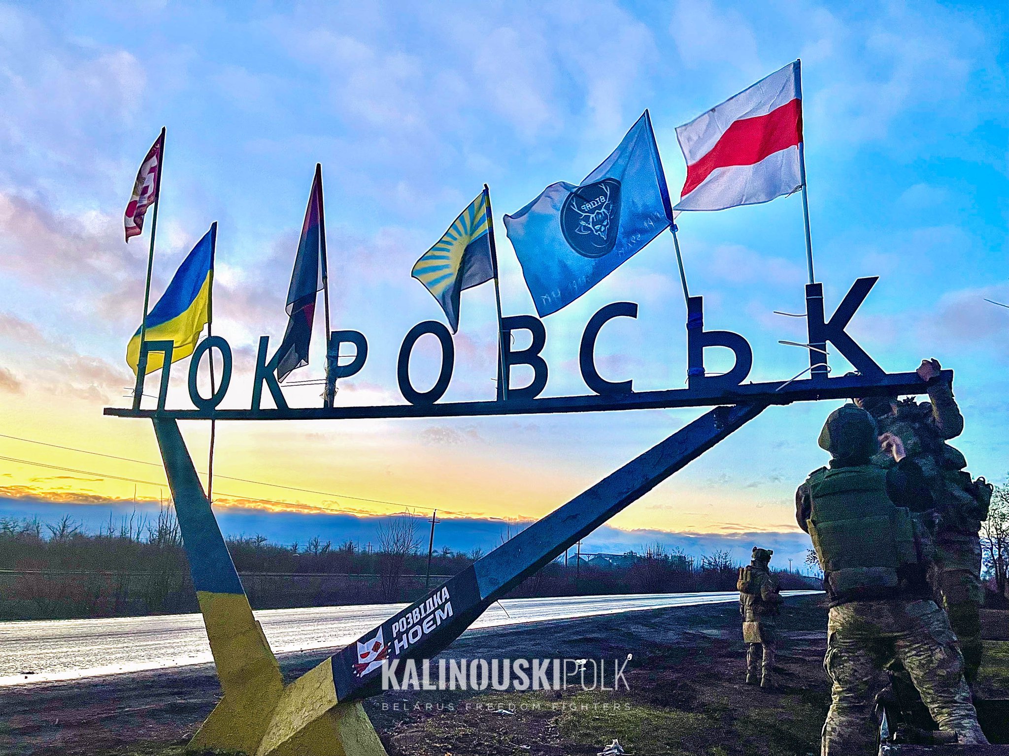 Belarusian flag on frontlines supporting Ukraine and fallen heroes