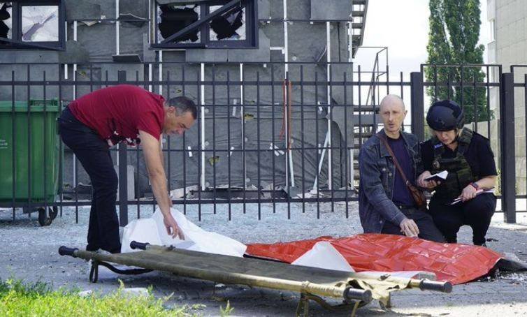 A Father Prays Over His Son’s Body in Kharkiv
