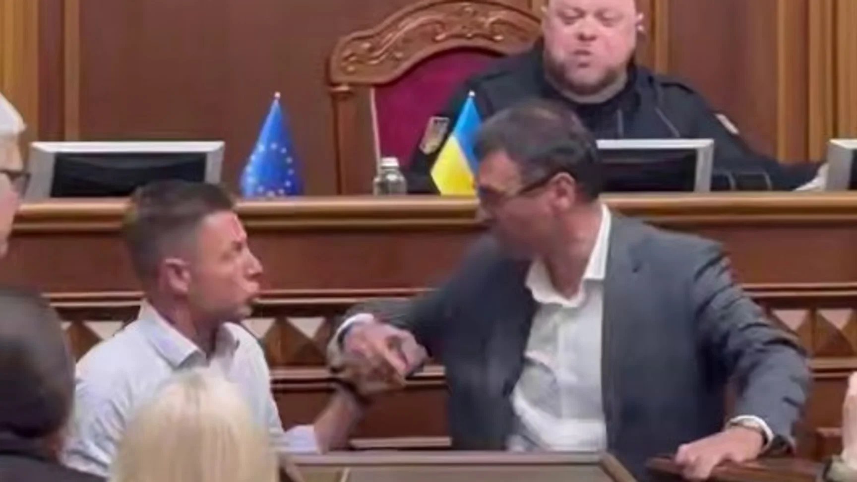 Ukrainian MPs scuffle in Verkhovna Rada over rostrum blockade