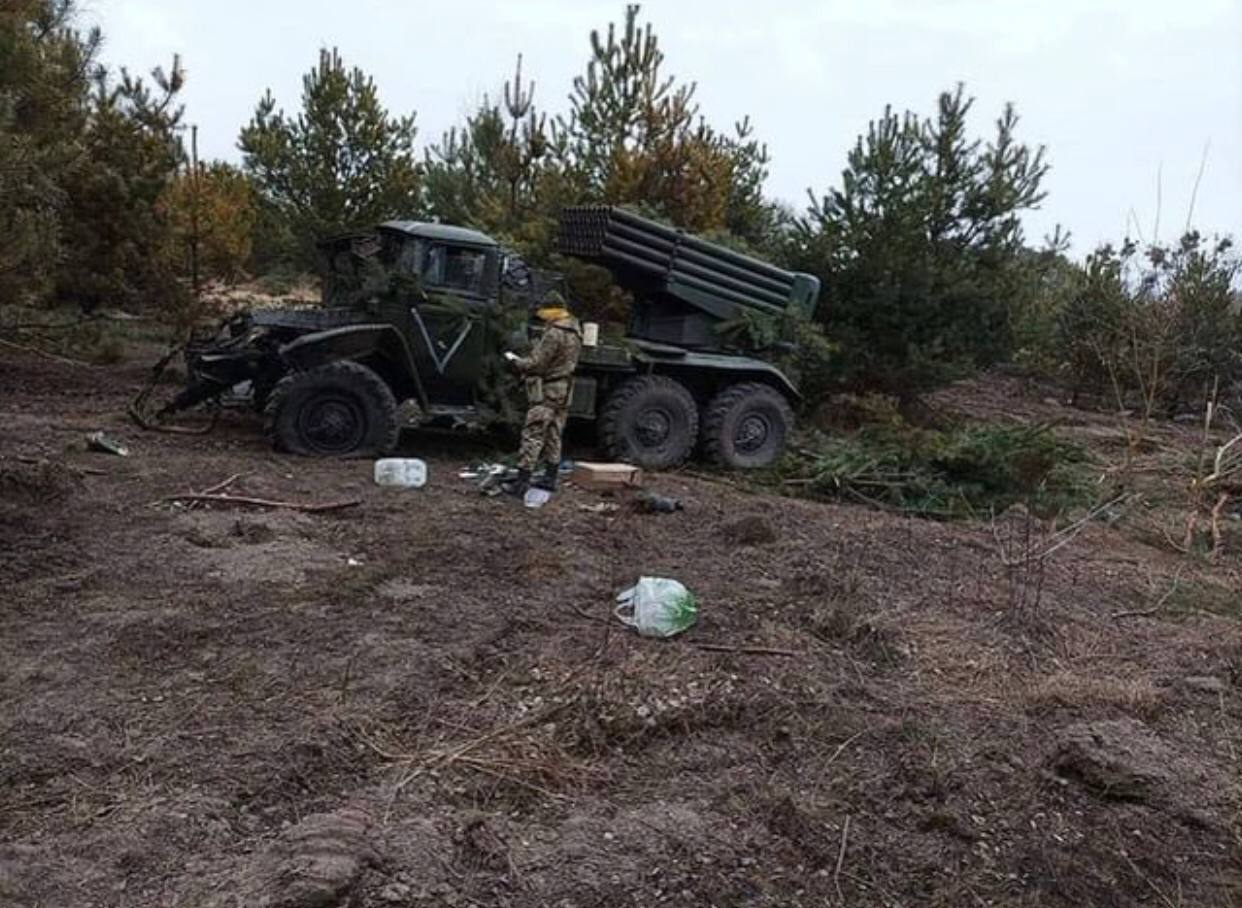 Ukrainian forces with captured Russian vehicles
