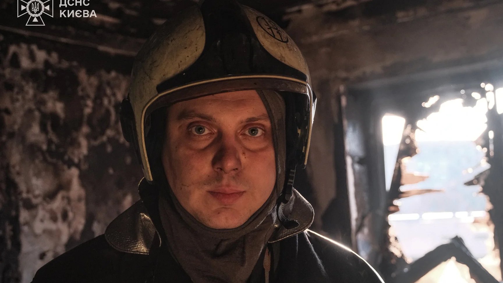 Kyiv rescuer extinguishes fire in own apartment after Russian drone strike