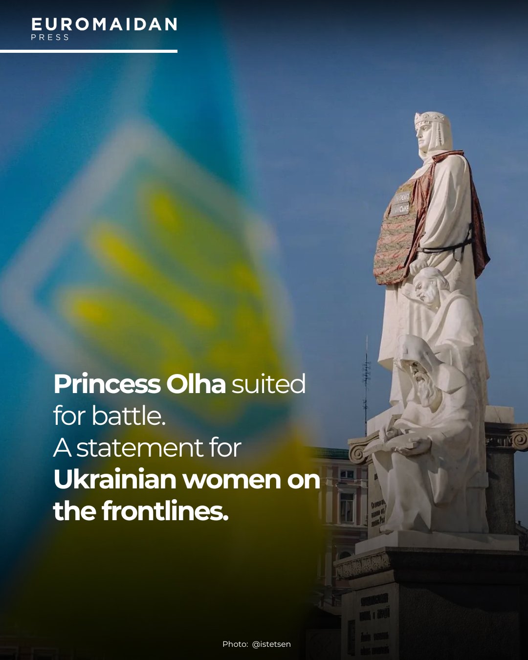 Female photographer in vest by Princess Olha monument