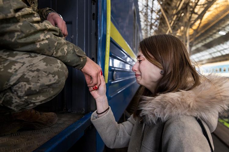 Soldier Volodimir says goodbye to girlfriend Tanya at Lviv station