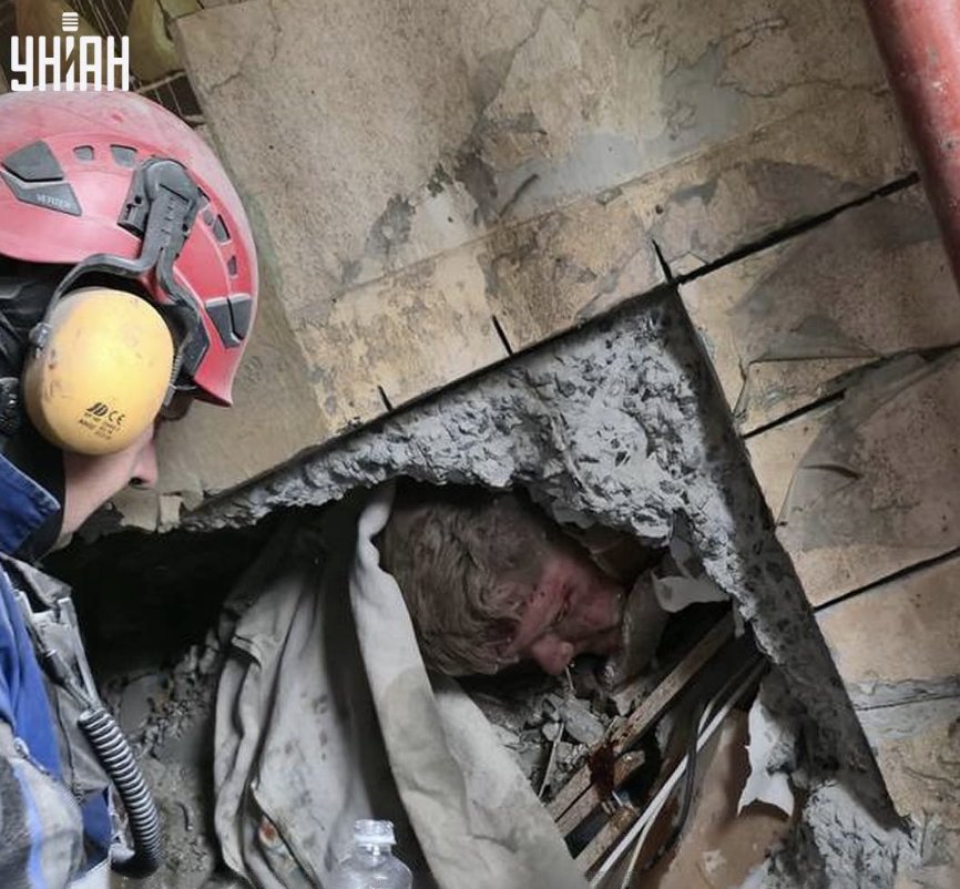 Rescue of a person, stuck under rubble