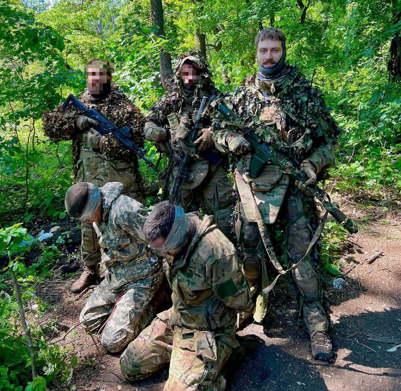 Two captured Russian soldiers from Kursk front