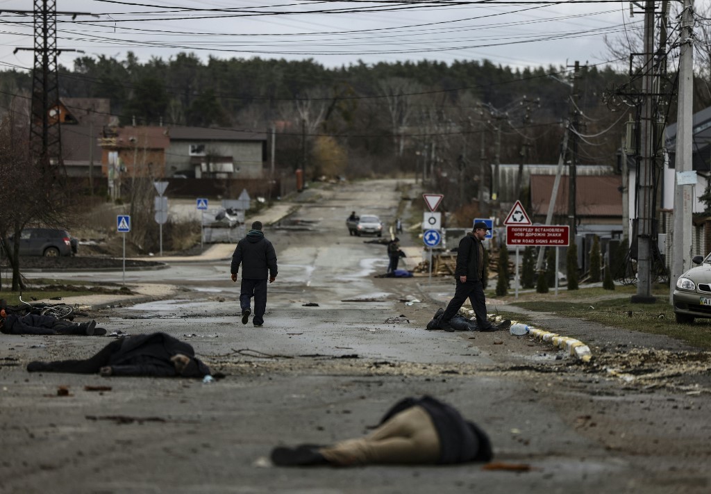 Ukraine claims Kyiv region as Russian pullback reveals horror