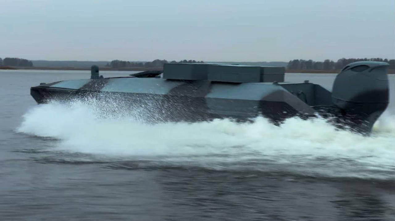 Ukrainian surface drone with four kamikaze drone containers