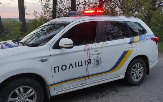 Civilian man in police car during attack in Vinnytsia region