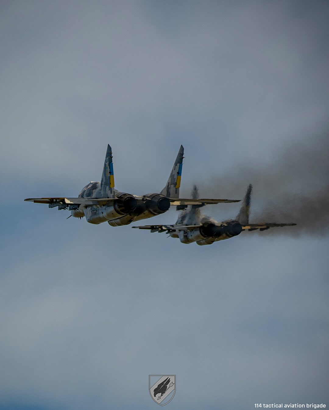 Two MiG-29 jets from 144th Tactical Aviation Brigade head for mission.