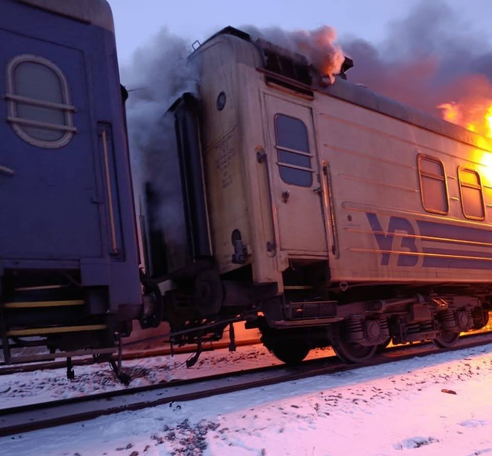 Ukrainian train hit by Russian air attack in Kharkiv region, carriage and locomotive on fire