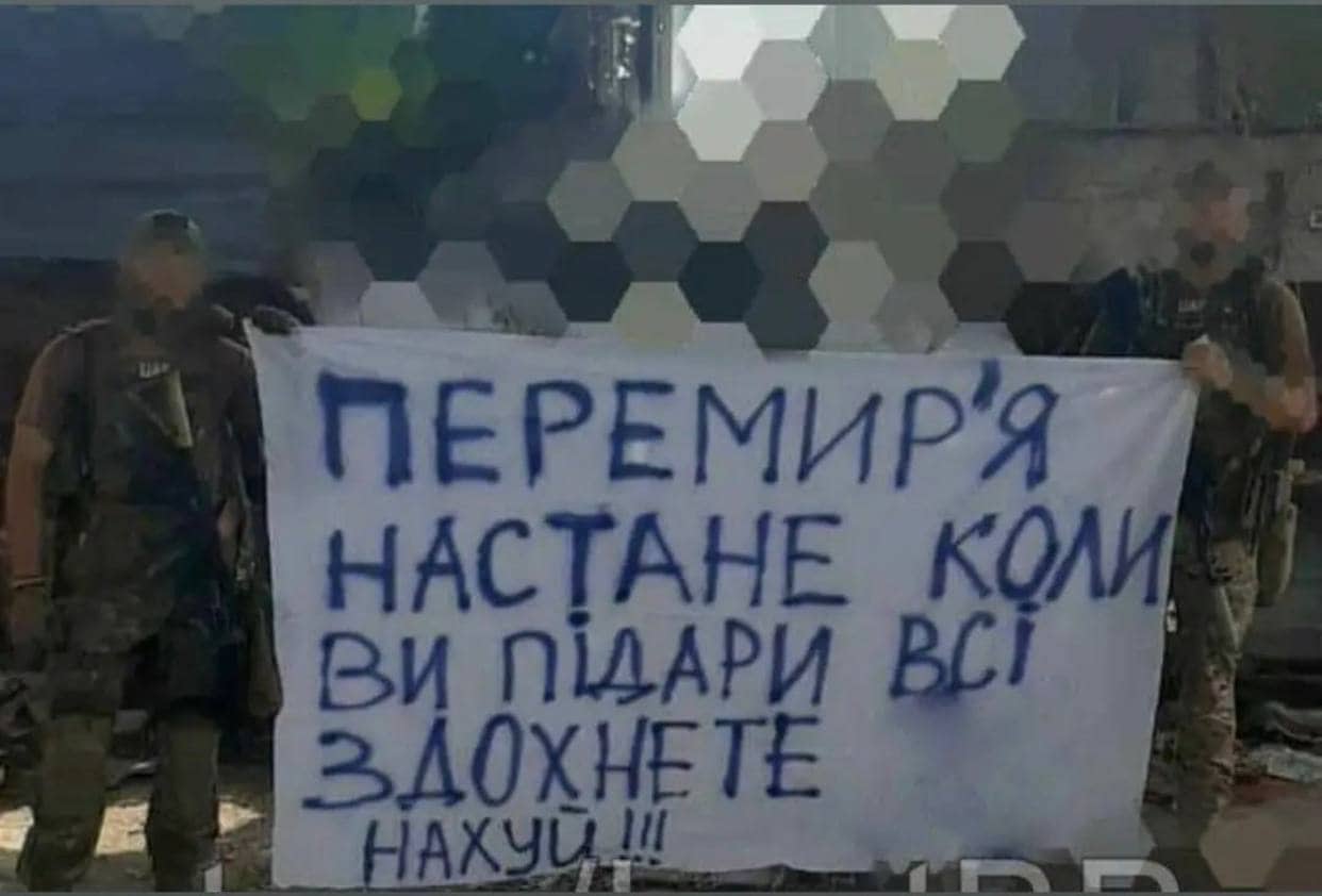 Drones observe Russians with white flags gathering year-old corpses in grey zone