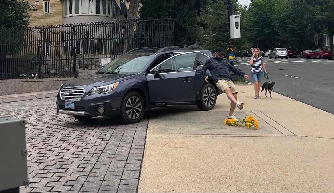 Russian diplomat trampled sunflowers brought by children to Russian embassy in Washington