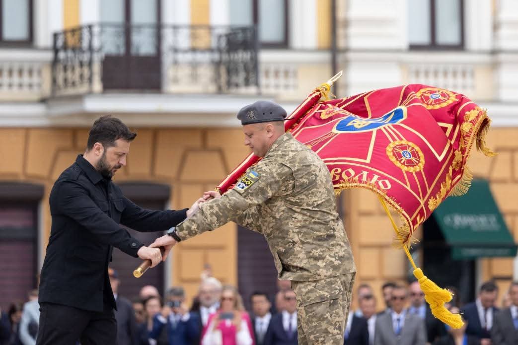 Zelensky presents battle flags to commanders