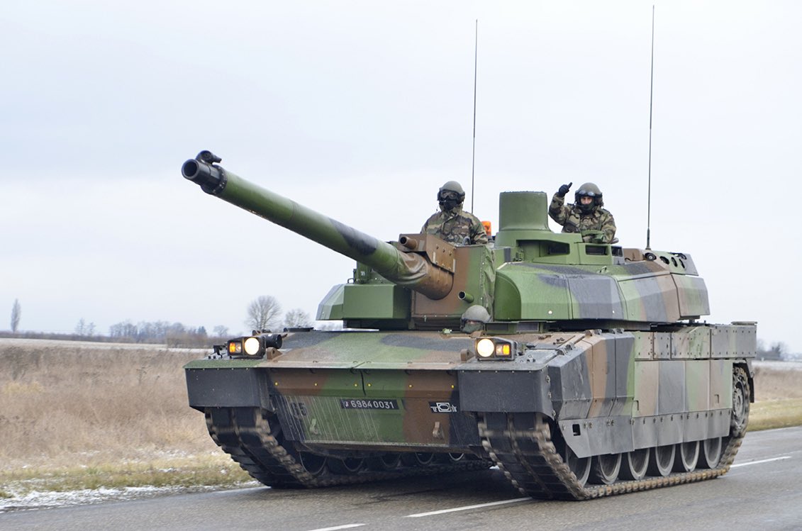 Macron announces more funds for tanks and helicopters