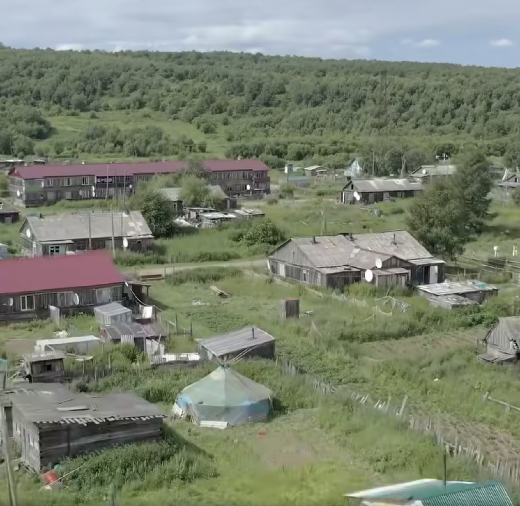 Local journalist: Soviet housing “eaten away by fungus,” smells bad