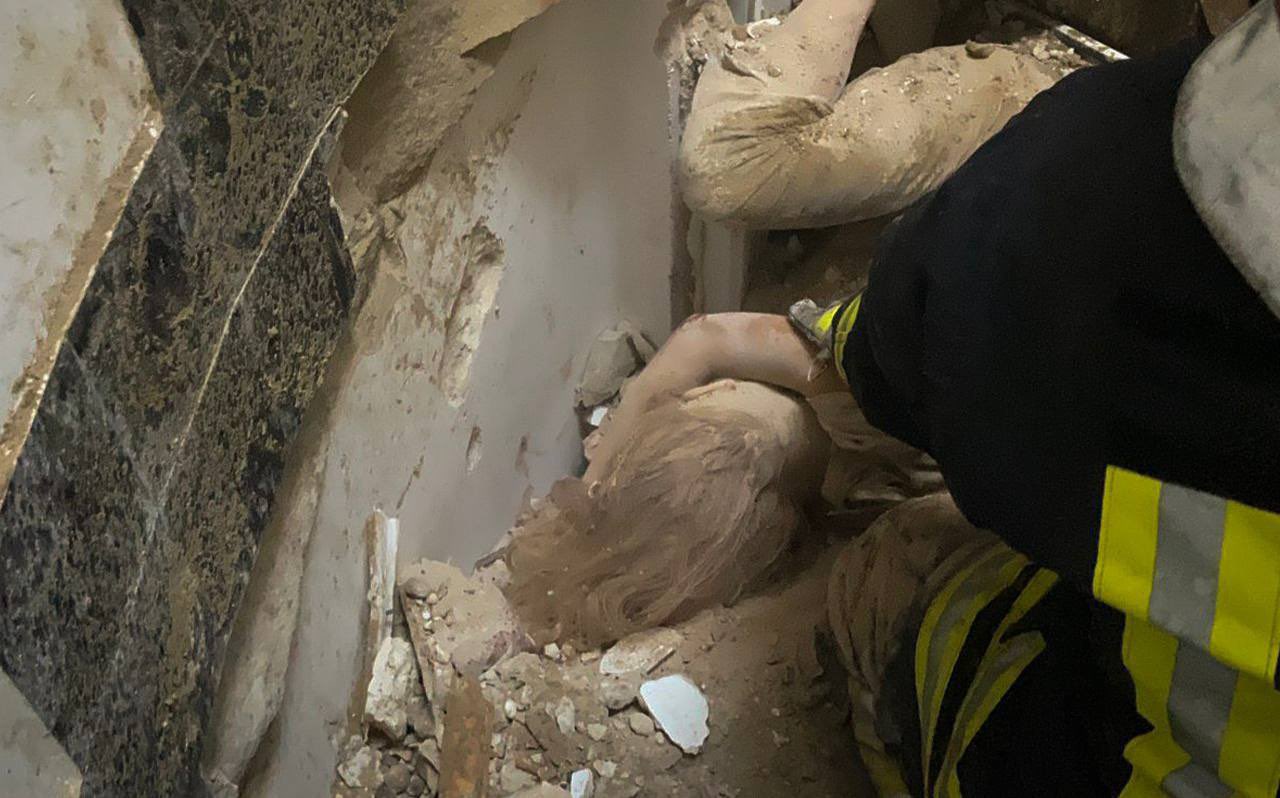Body of a little girl buried under rubble