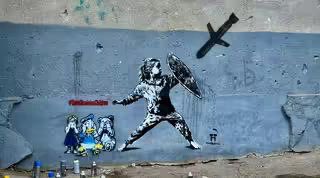 Ternopil mural honors children killed by Russian missiles, calls for protection.