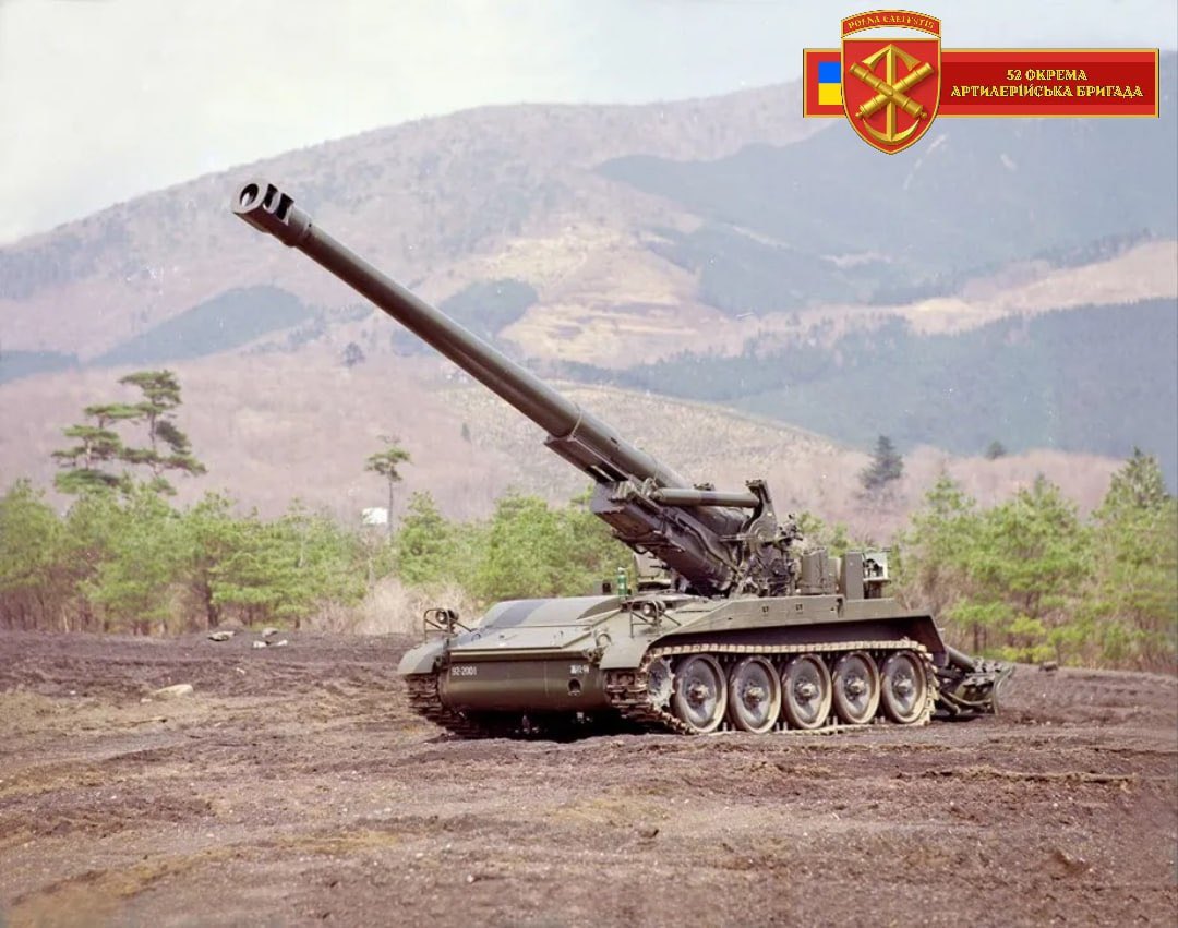 Soldiers of the 52nd Artillery Brigade armed with M110 203mm