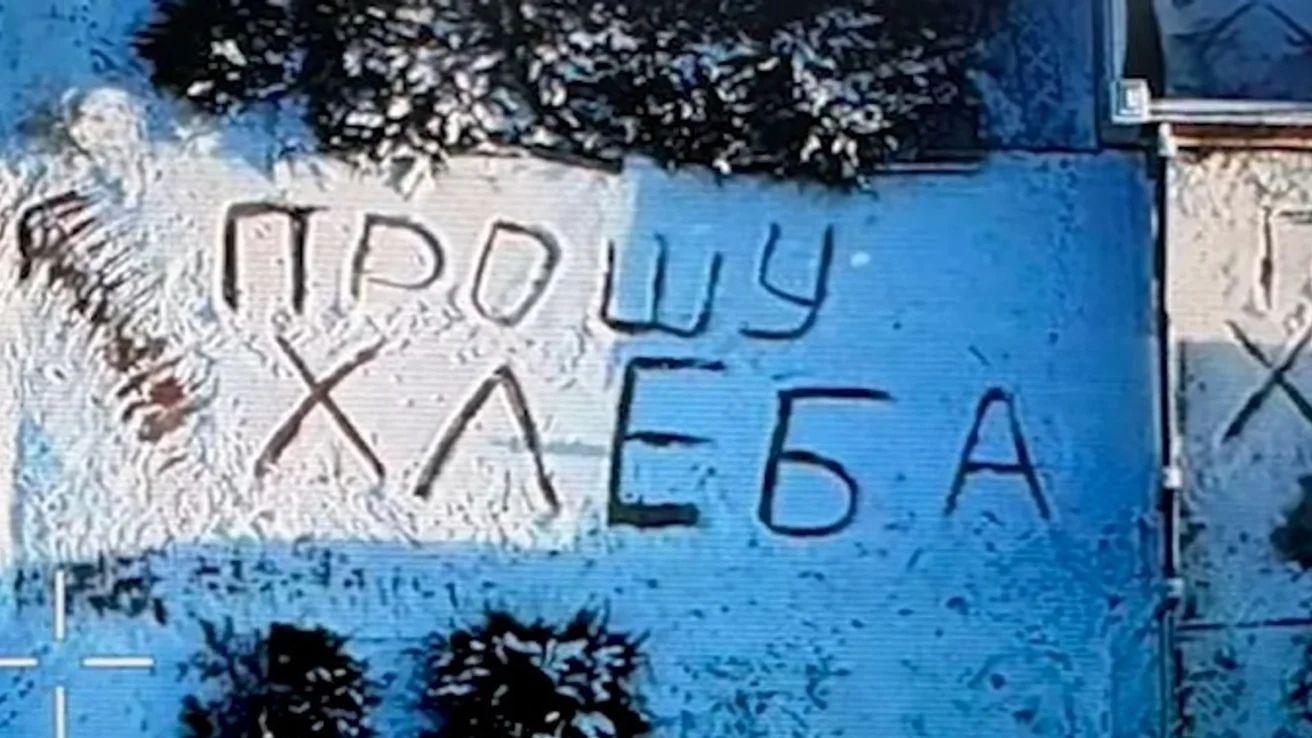 Ukrainian drone operator delivers bread to elderly woman in snow