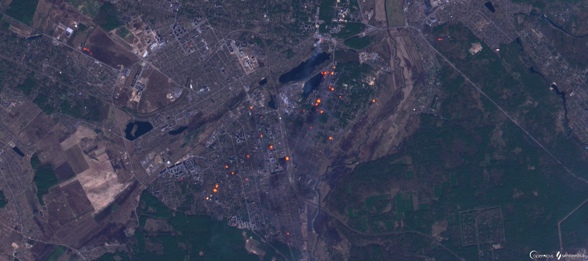 Fires burning in Irpin/Bucha, northwest of Kyiv; orange pixels not flames