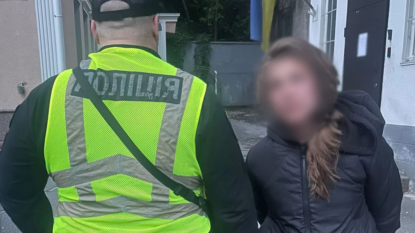 Woman damages photos of fallen soldiers at memorial