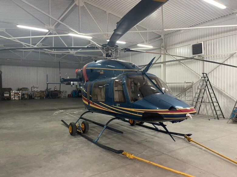 Law enforcers handed over to the Armed Forces a helicopter and a plane