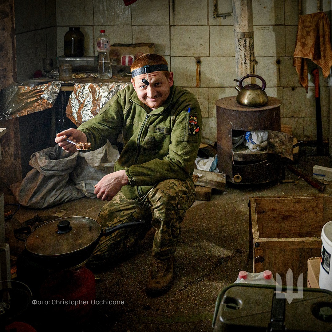 Lunch break on the front line captured by Christopher Occhicone.