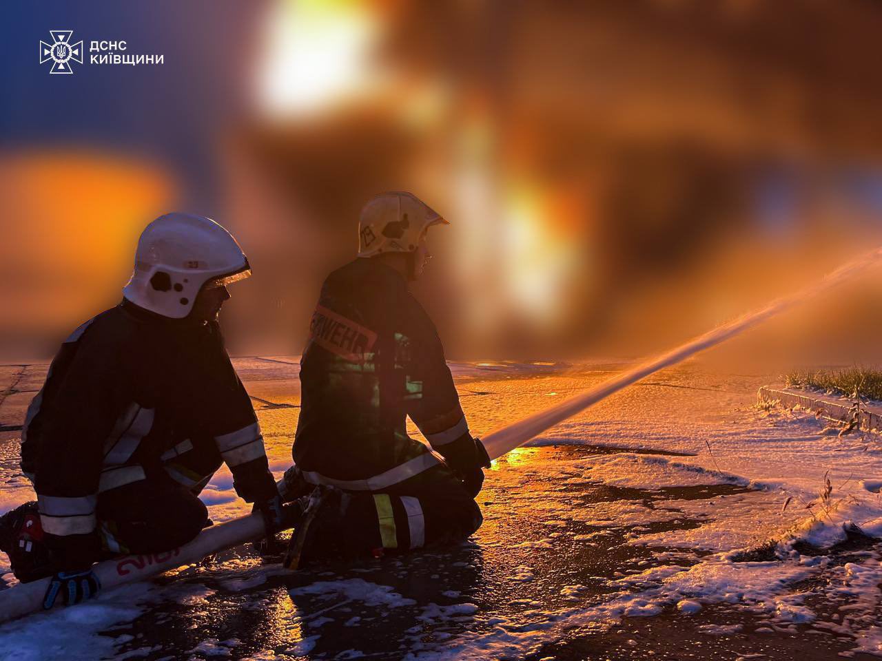 Rescuers battle fire after attack near Kyiv region