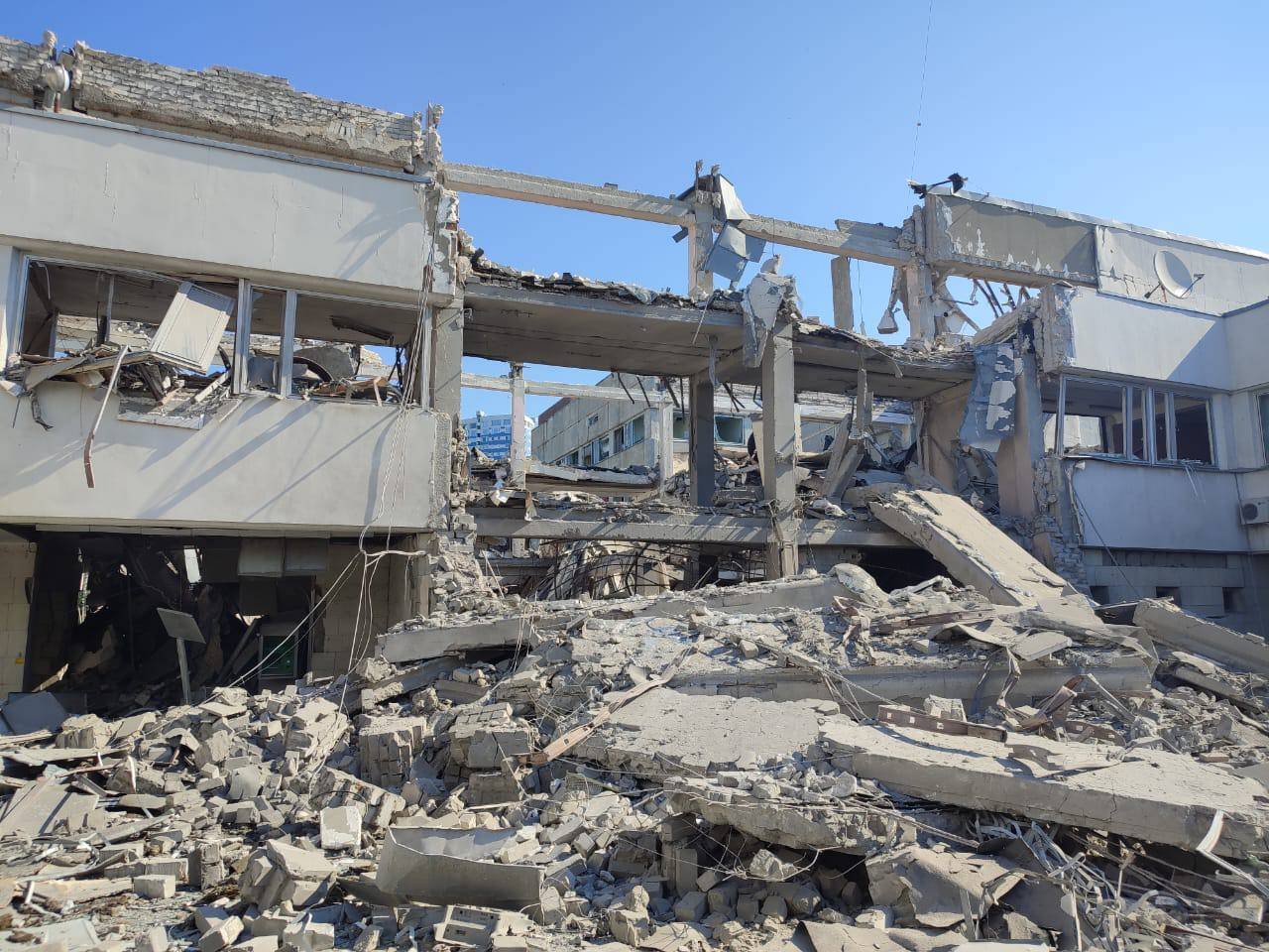 Russian missile destroys Kharkiv university and monument, defiance remains.