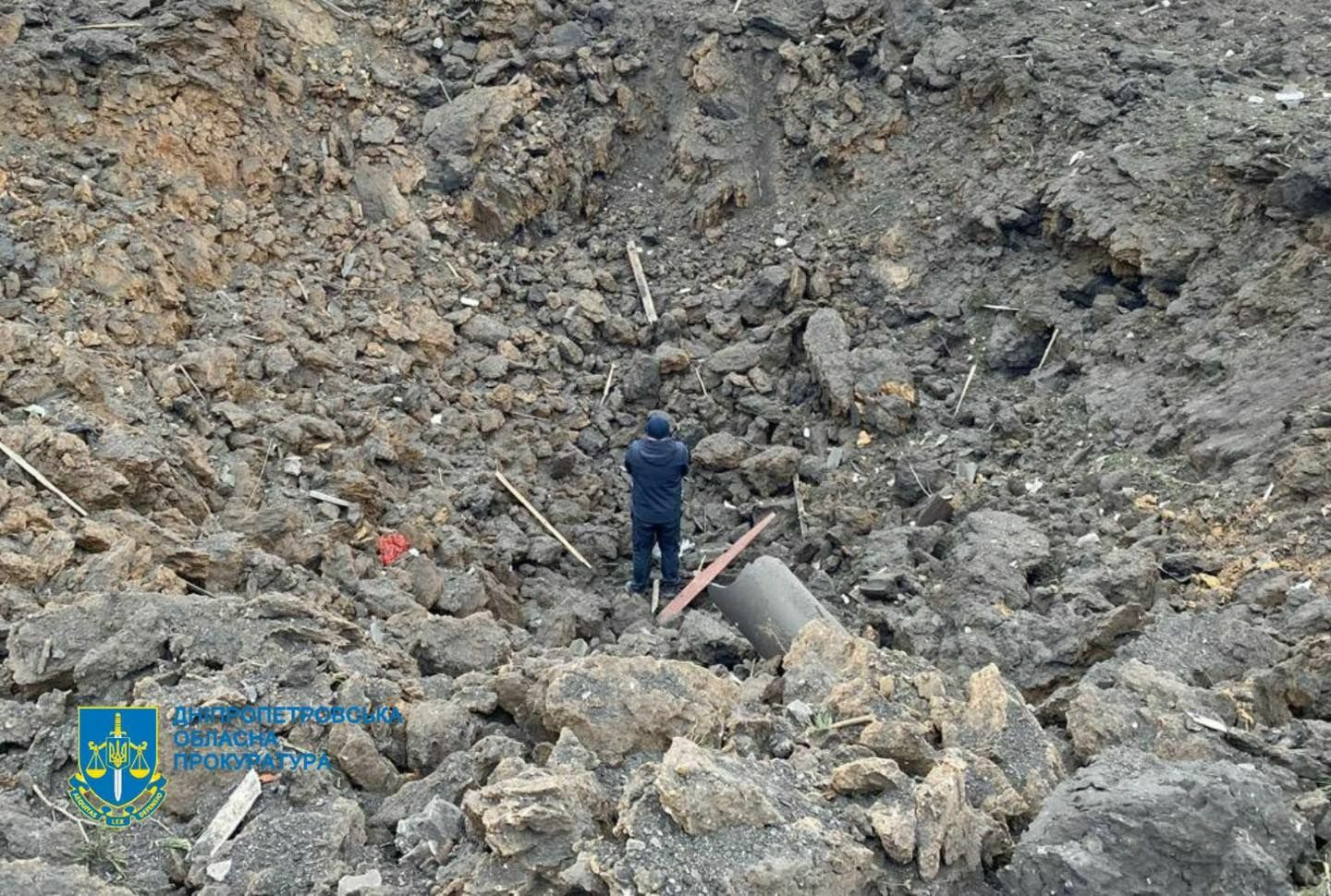 Russian strike on Dnipropetrovsk Oblast leaves crater, injures workers
