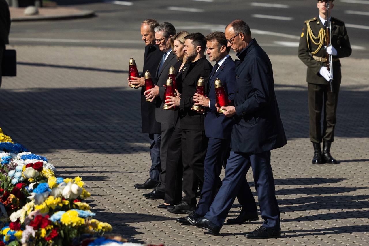 Macron, Merz, Starmer, Tusk join Zelensky in Kyiv to honor fallen soldiers.