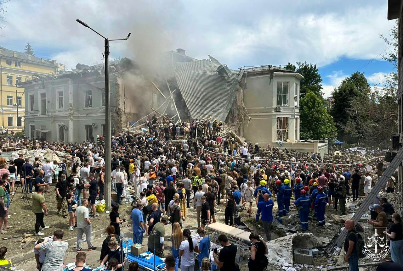 Ukrainians rush to help dig out rubble after hospital bombing