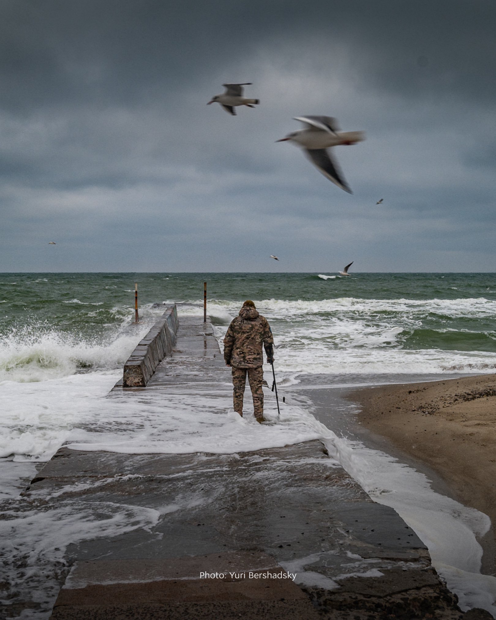 Wounded Ukrainian soldier silently faces Black Sea storm