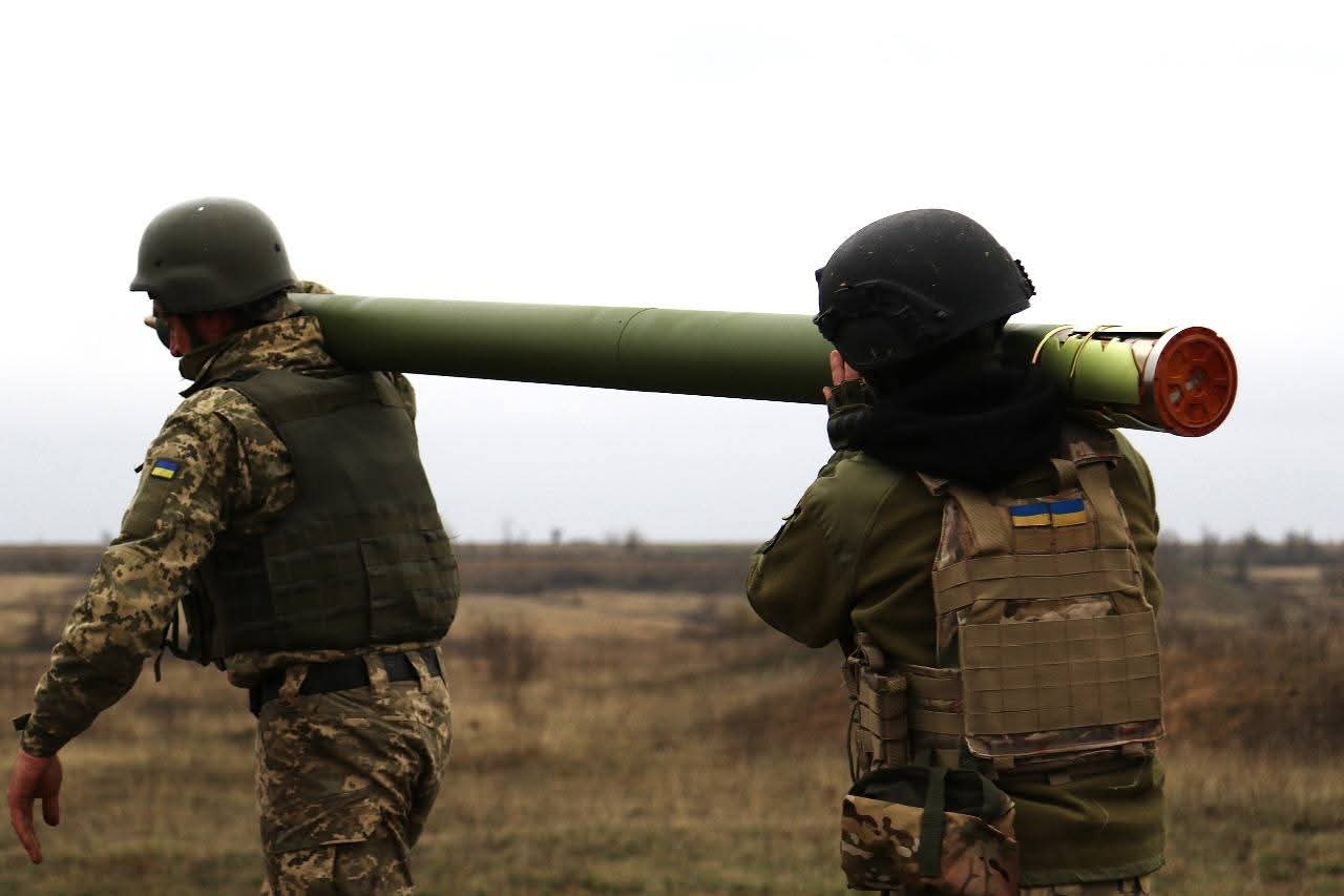 Rocket unit artillerymen prepare for salvo fire at ranges